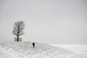 snowy-hillside-man-and-tree_4460x4460.jpg
